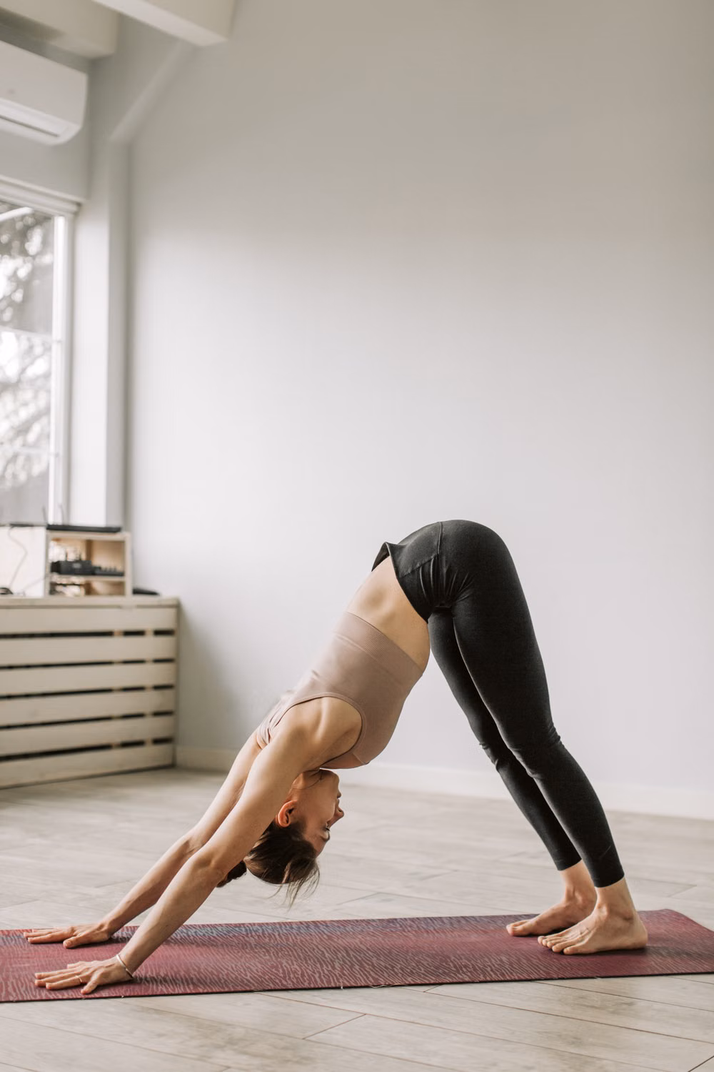 A flowing yoga pose on the mat